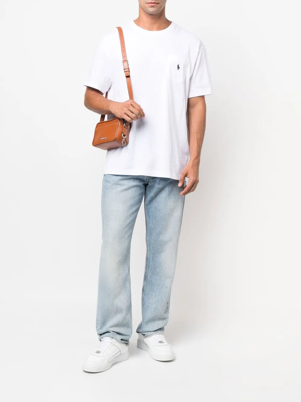 White T-shirt worn by a person, showing the T-shirt's fit