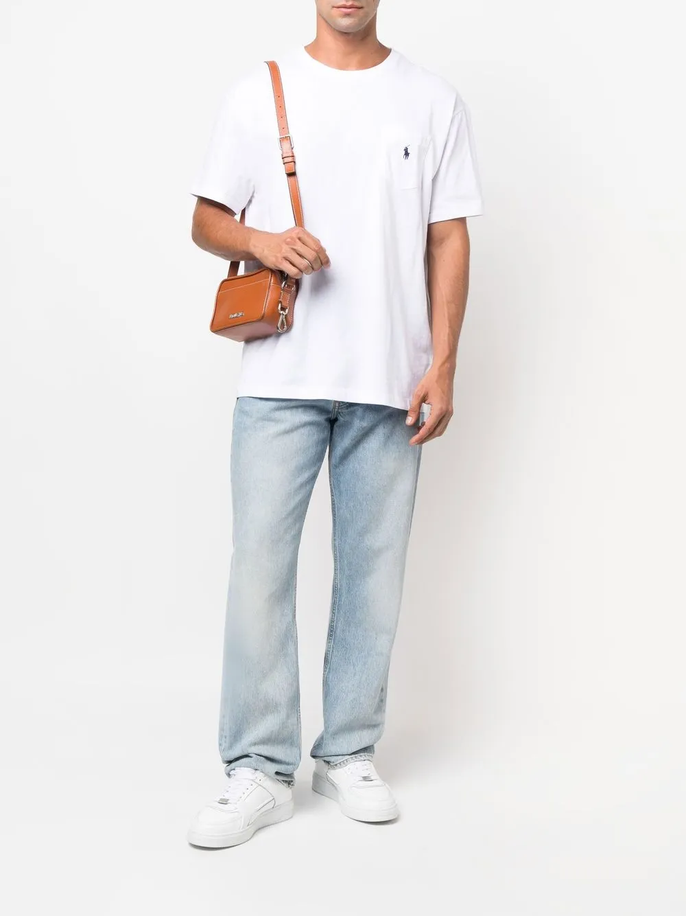 White T-shirt worn by a person, showing the T-shirt's fit