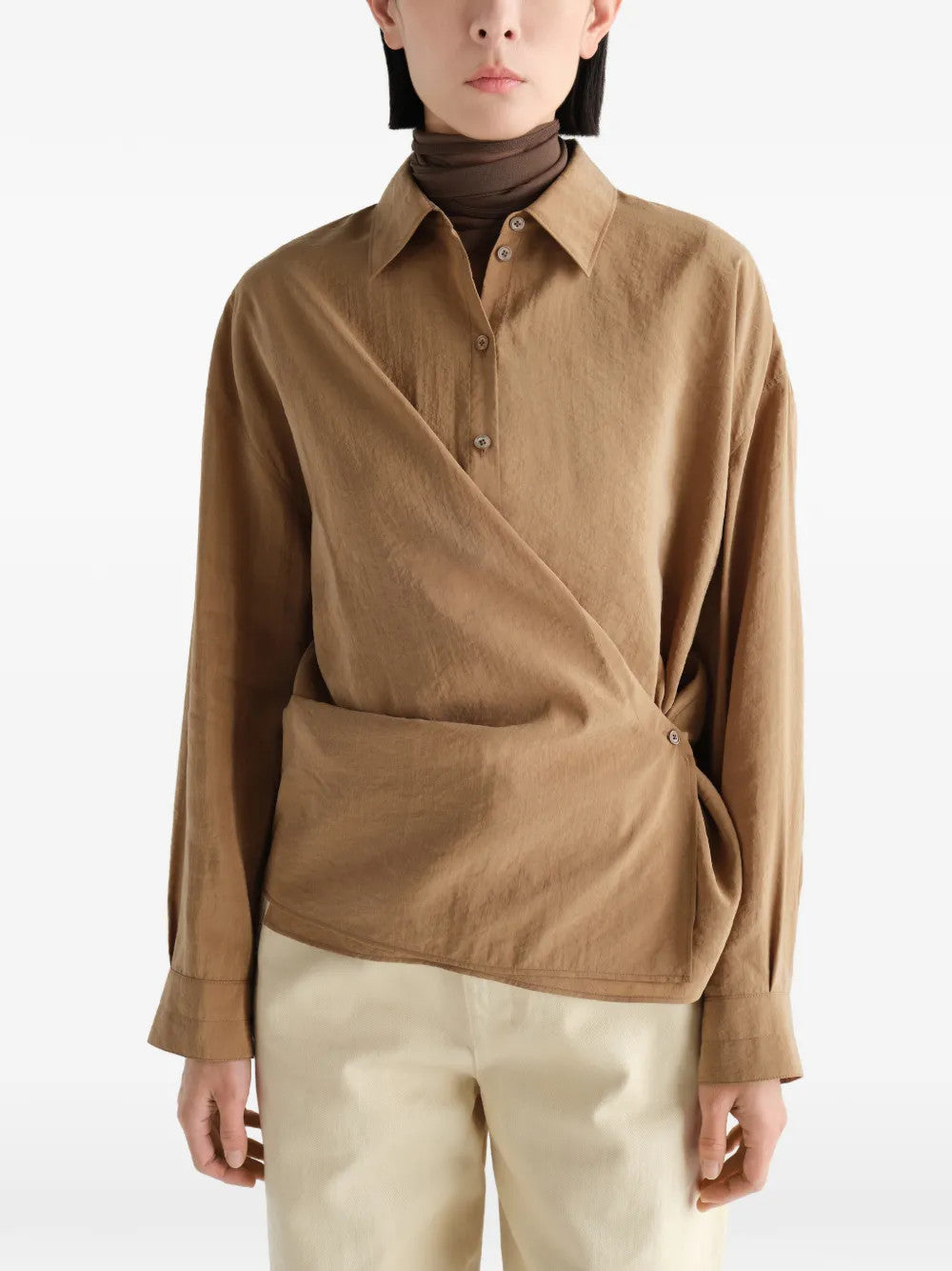 Tan dress worn by a person, showing the dress fit