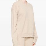 Tan top worn by a person, showing the top fit