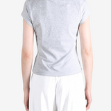 Grey shirt worn by a person, showing the shirt fit