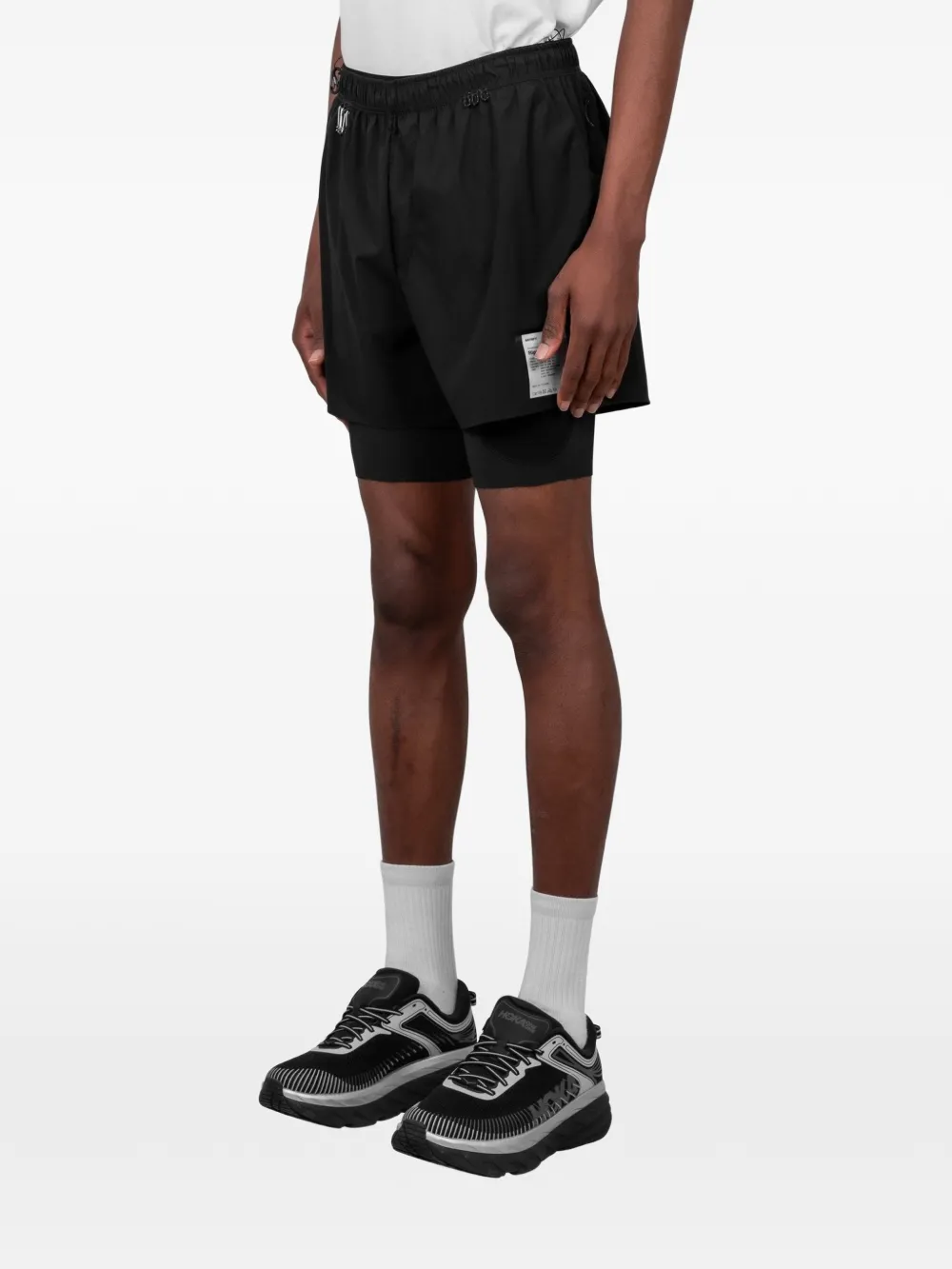 Black shorts, full body view