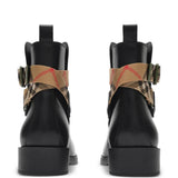 Black boots, back view