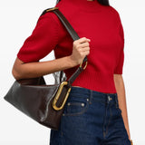 Brown bag worn by a person, showing the bag fit