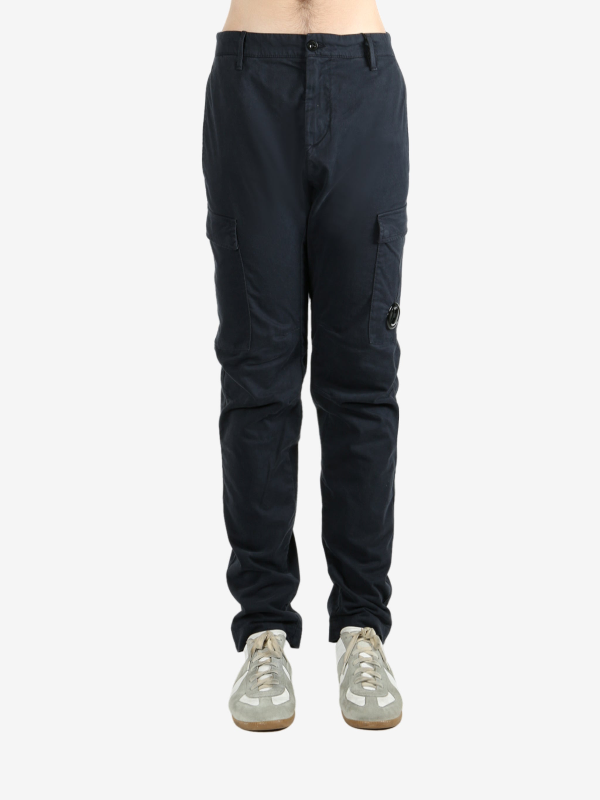 Blue pants worn by a person, showing the pants fit