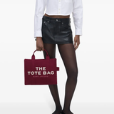 Burgundy bag, full body view