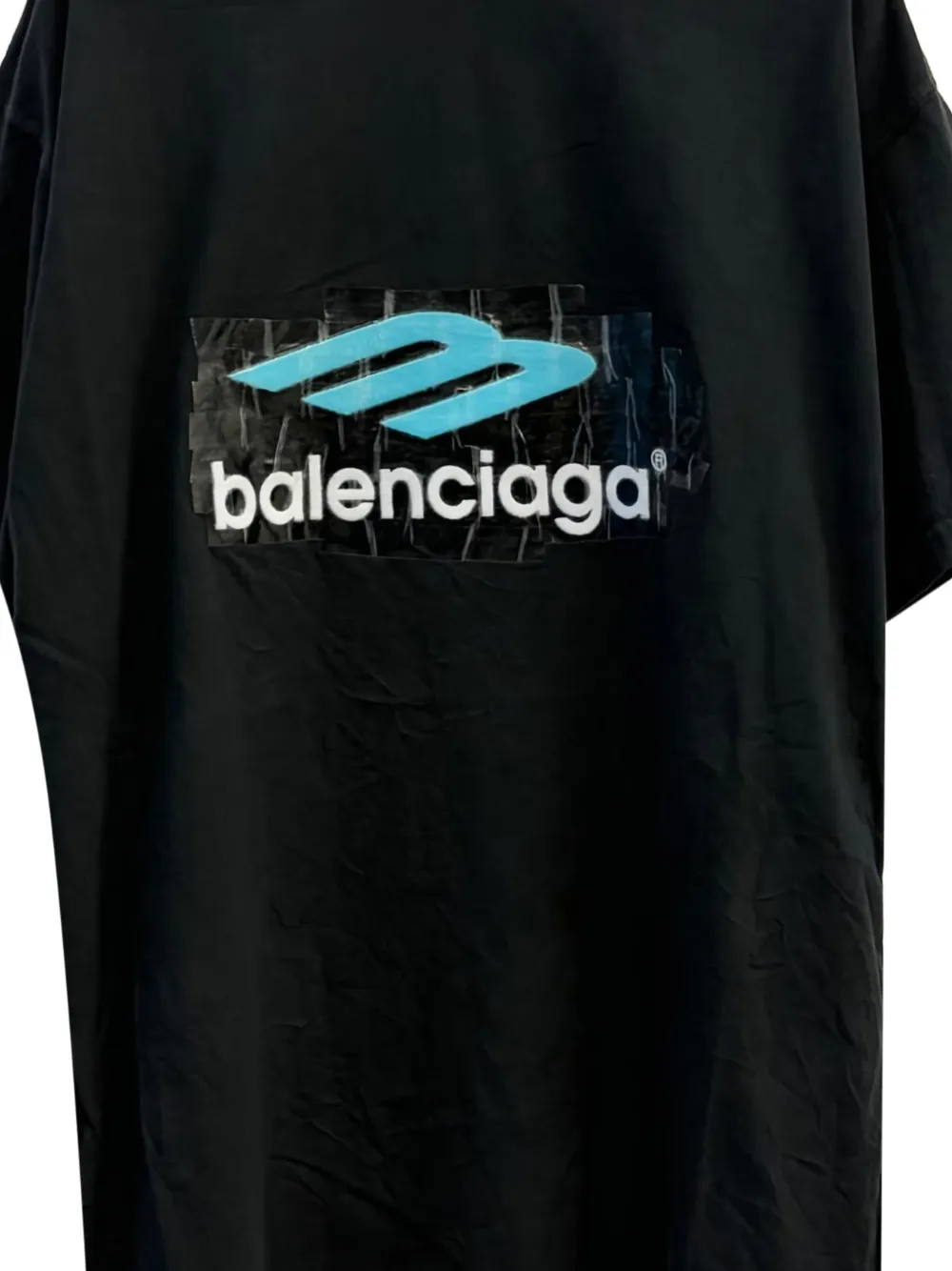 Close up of black t-shirt, showing texture of the Cotton fabric