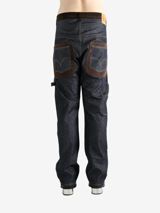 Blue jeans worn by a person, showing the jeans' fit