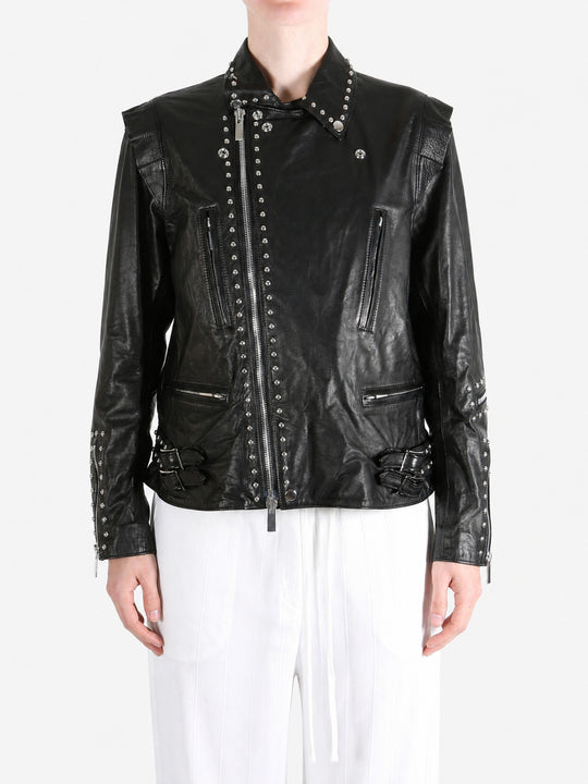 Black jacket worn by a person, showing the jacket fit