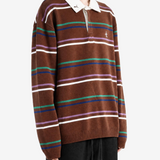 Brown top worn by a person, showing the top fit