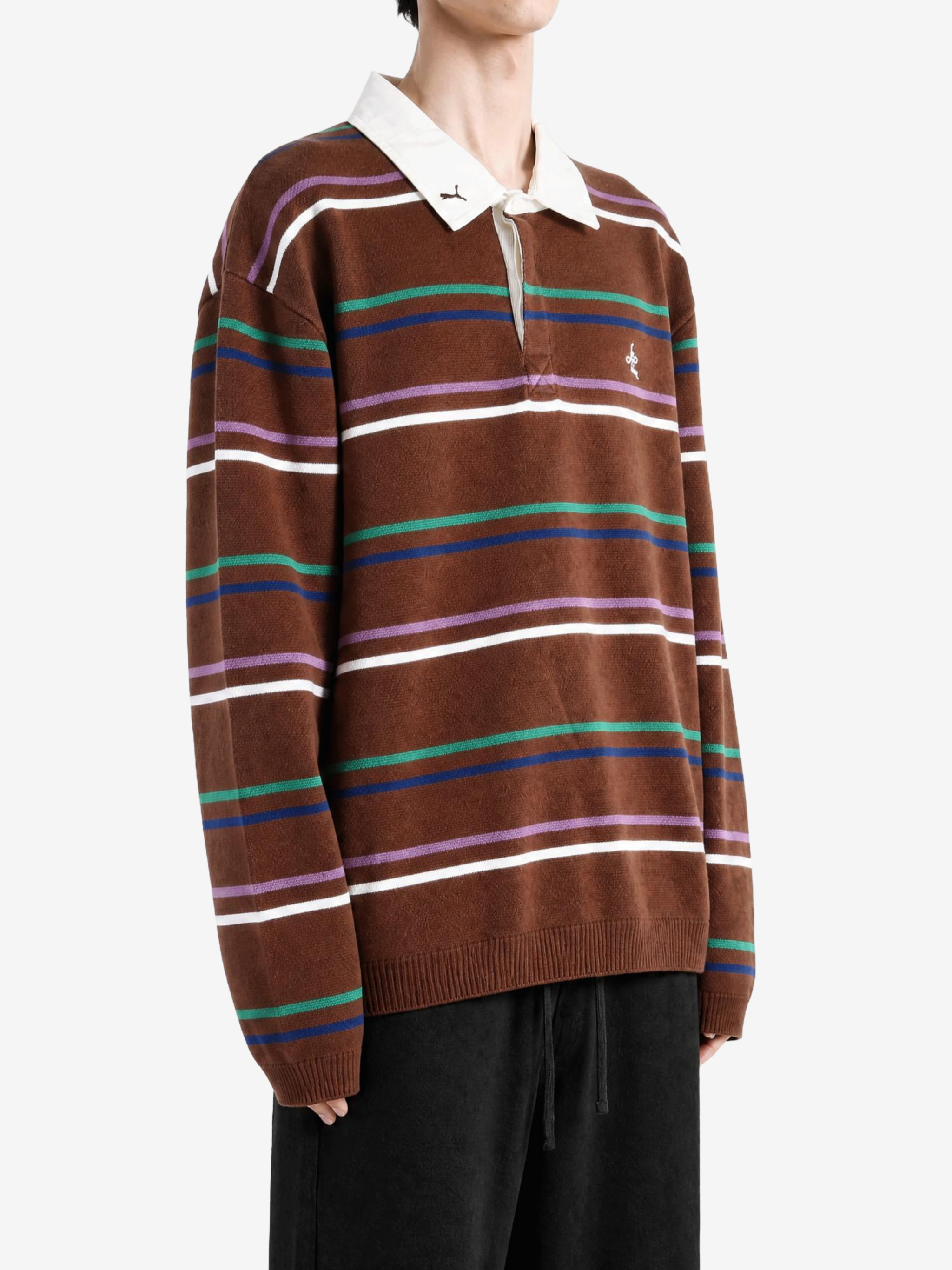 Brown top worn by a person, showing the top fit