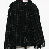 Black jacket worn by a person, showing the jacket fit