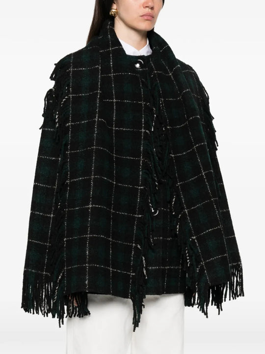 Black jacket worn by a person, showing the jacket fit