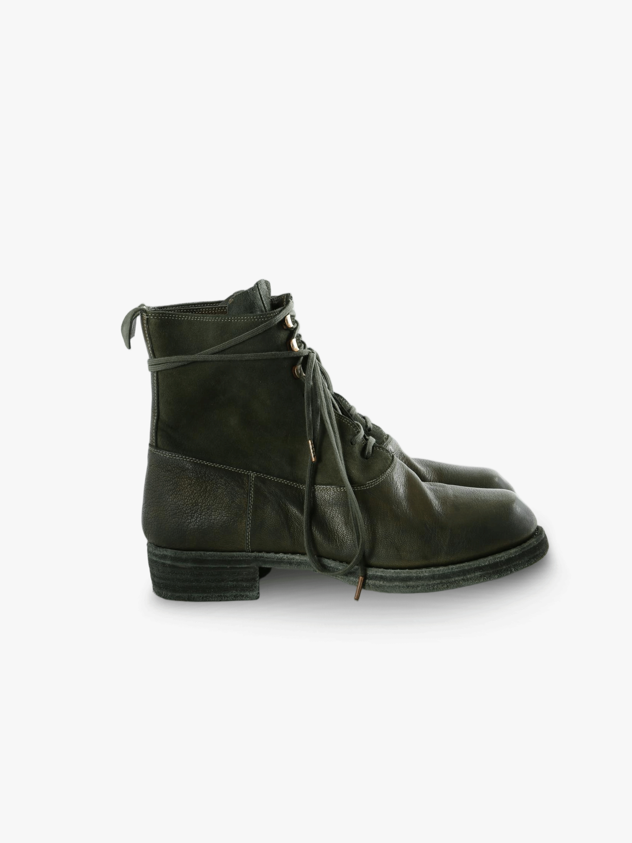 Green boots, side view