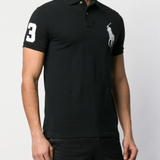 Black shirts worn by a person, showing the shirts fit