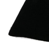 Close up of black hats, showing texture of the cashmere fabric