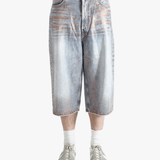 Blue shorts worn by a person, showing the shorts fit