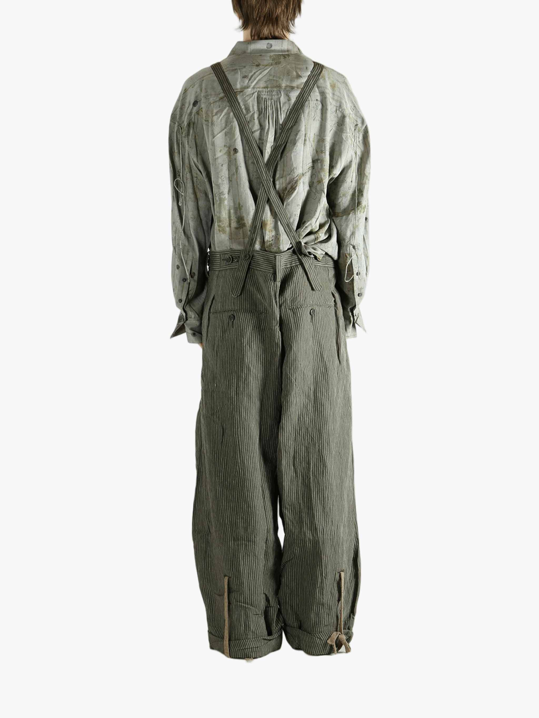 Green pants worn by a person, showing the pants's fit