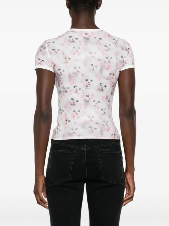 White t-shirt worn by a person, showing the shirt's fit