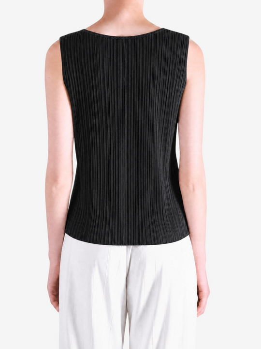 Black shirt worn by a person, showing the shirt fit