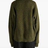 Green top, full body view