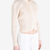 Tan jacket worn by a person, showing the jacket fit