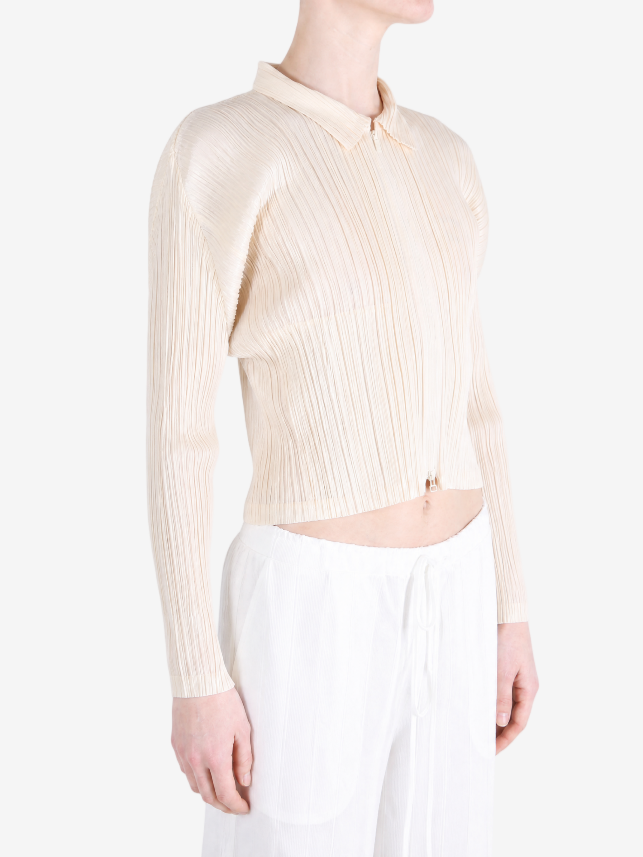 Tan jacket worn by a person, showing the jacket fit