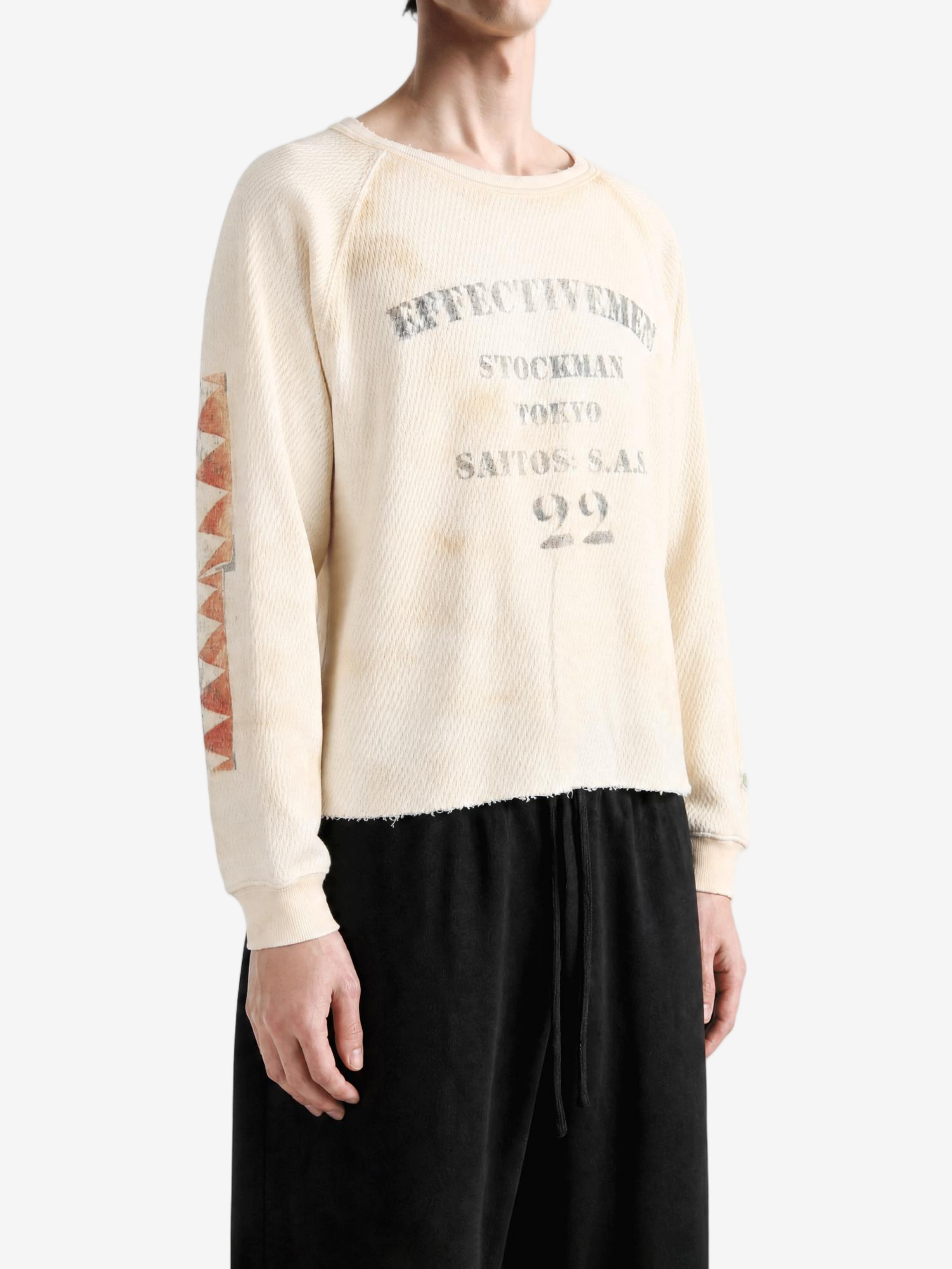 Tan top worn by a person, showing the top fit