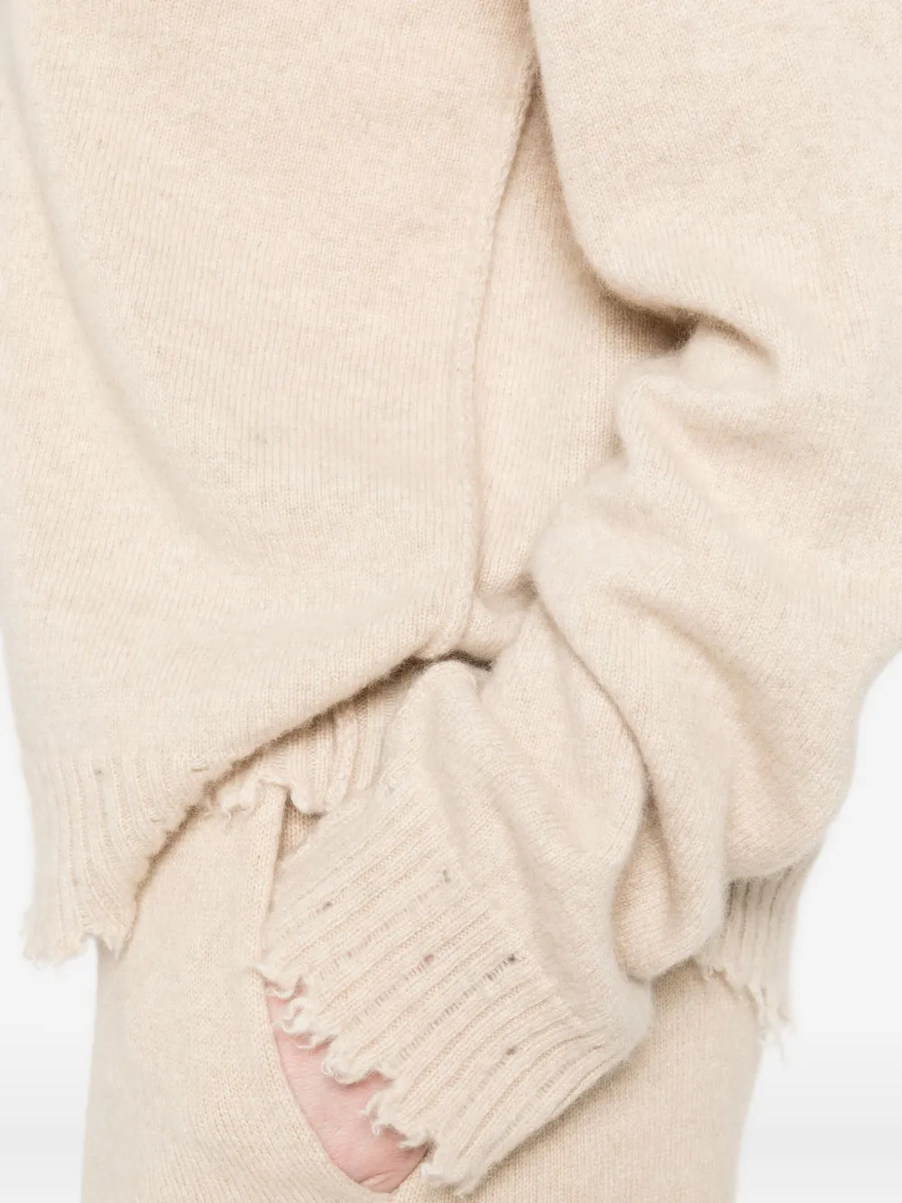 Close up of tan top,showing texture of the cashmere fabric.