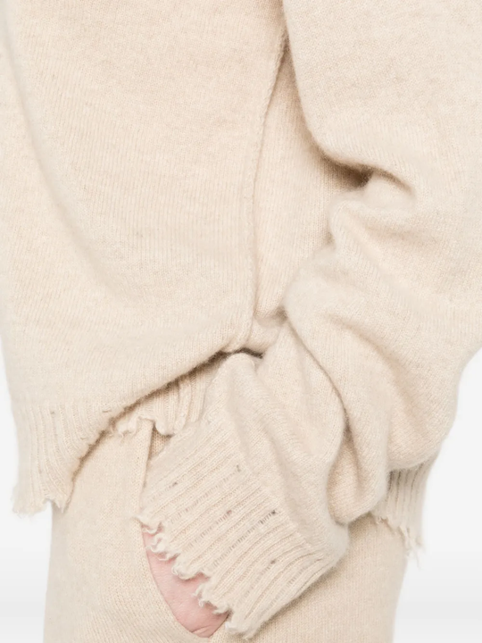 Close up of tan top,showing texture of the cashmere fabric.