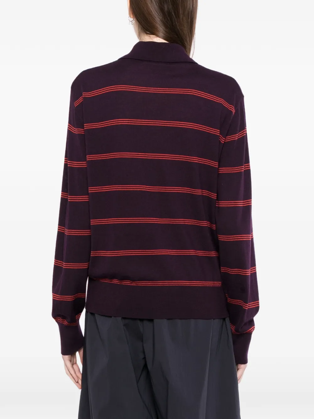 Purple sweater worn by a person, showing the sweater fit