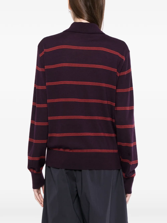 Purple sweater worn by a person, showing the sweater fit