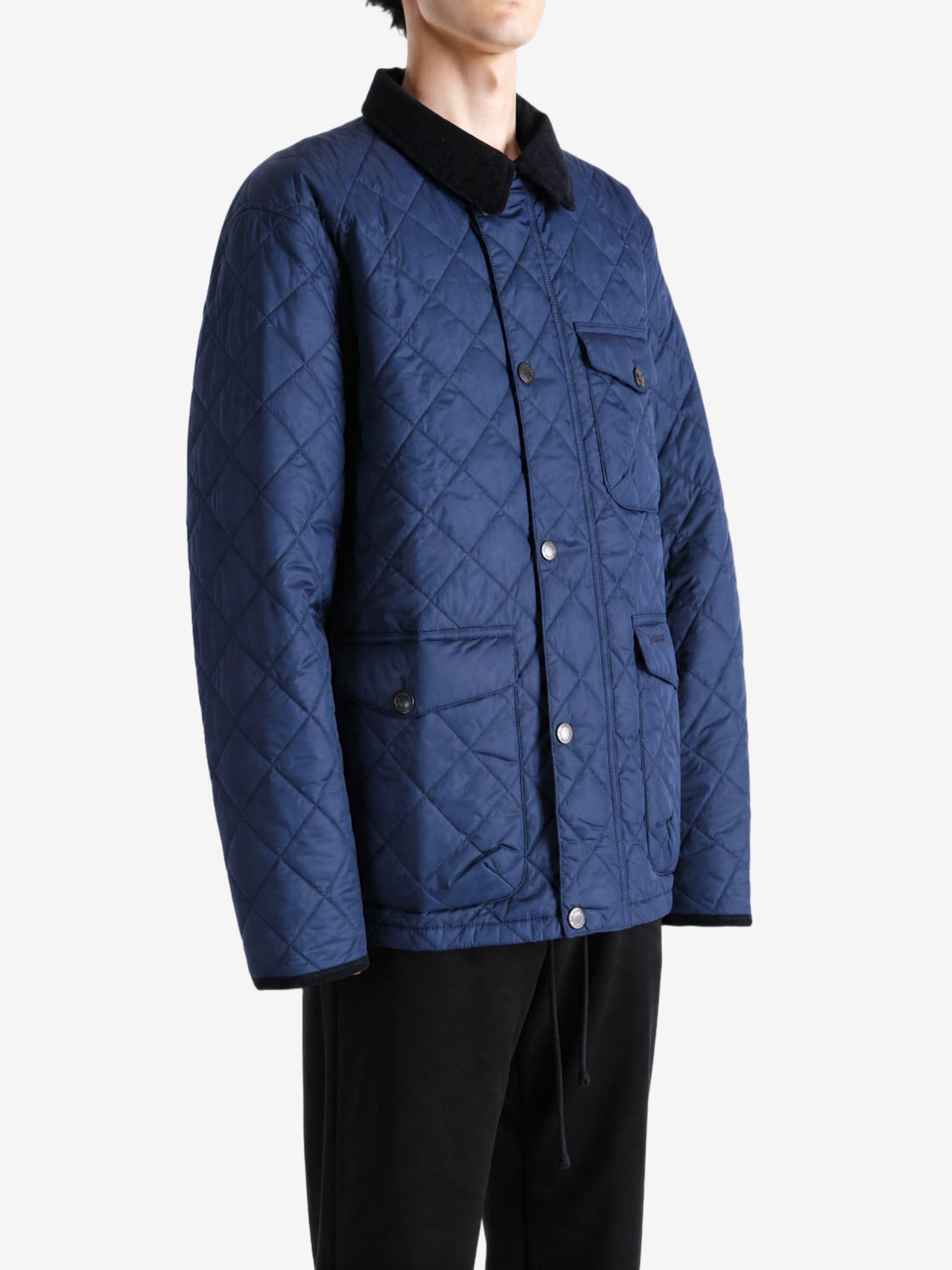 Navy jacket worn by a person, showing the jacket fit