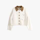Tan knitwear, front view