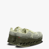 Green sneakers, back view