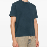 Blue shirt worn by a person, showing the shirt's fit