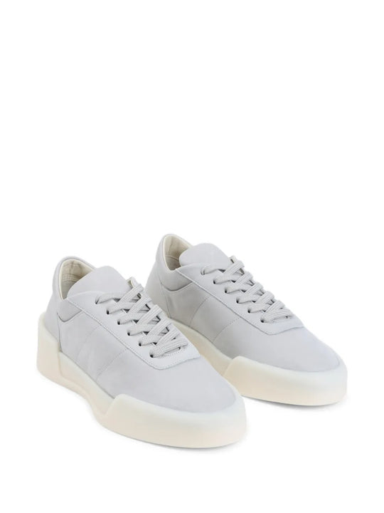 Grey sneakers, side view