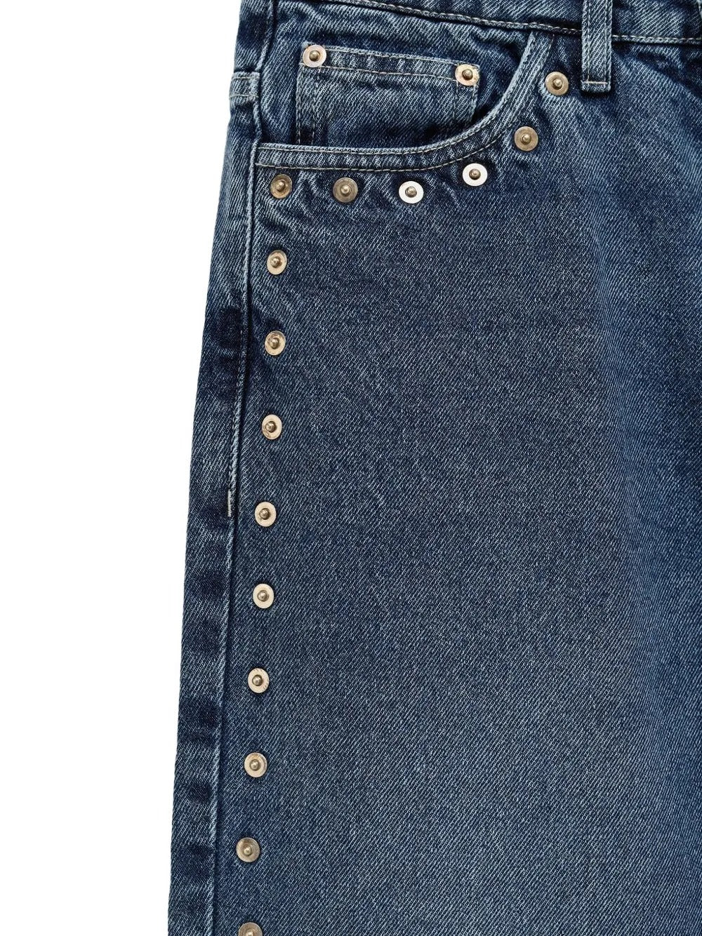 Close up of the blue jeans, showing texture of the cotton fabric