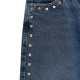 Close up of the blue jeans, showing texture of the cotton fabric