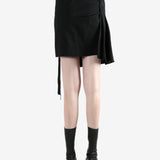 Black skirt worn by a person, showing the skirt's fit