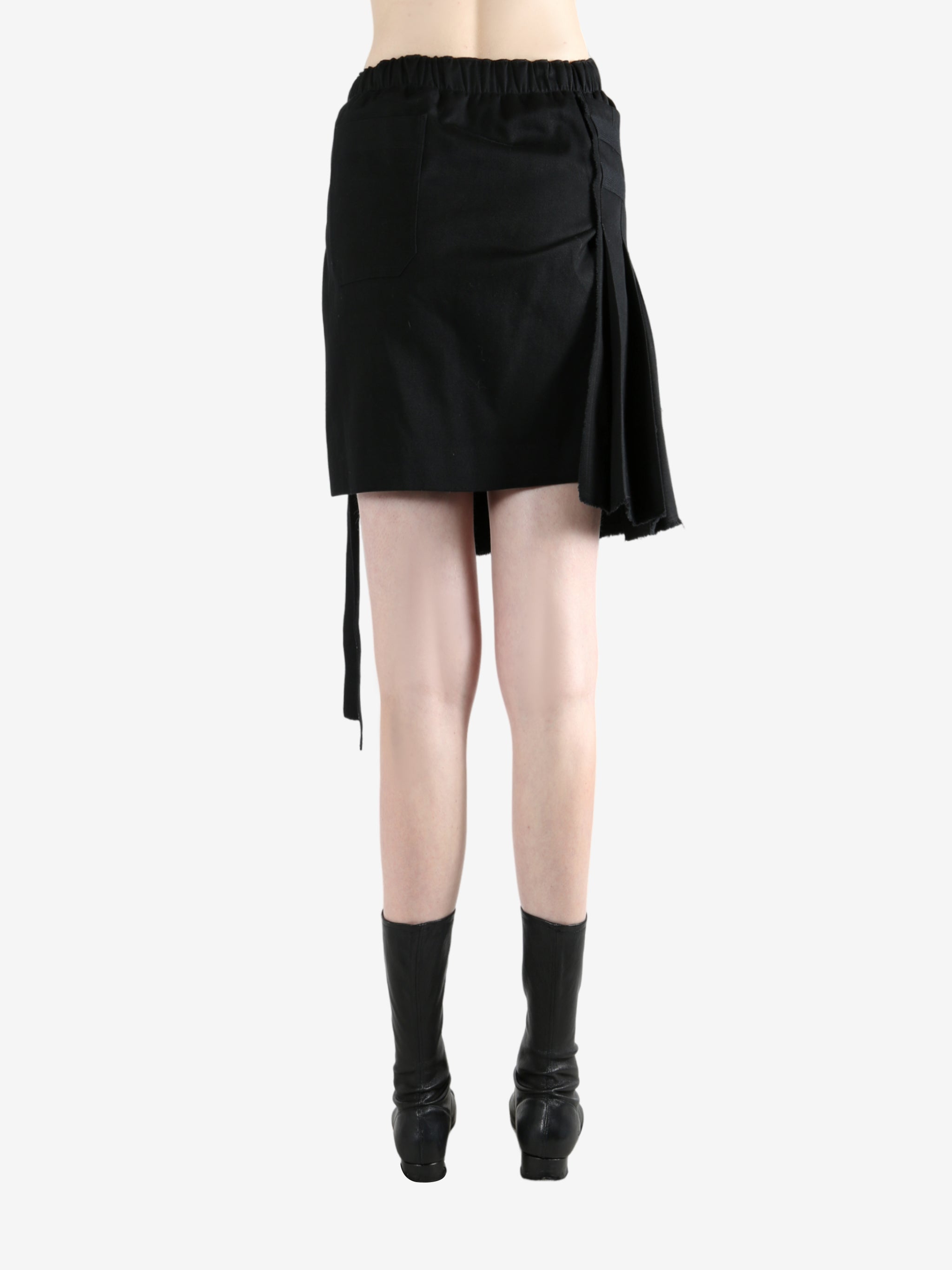 Black skirt worn by a person, showing the skirt's fit