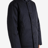 Navy jacket worn by a person, showing the jacket fit
