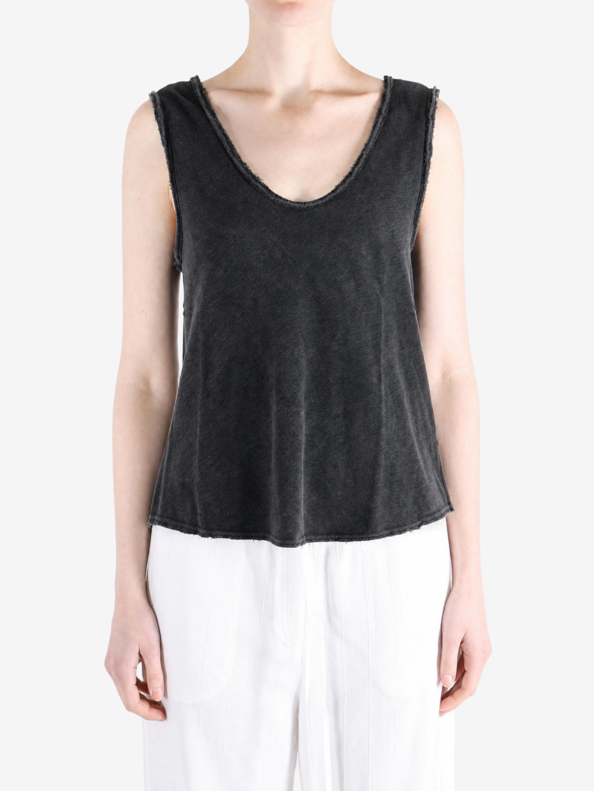 Black top worn by a person, showing the top fit