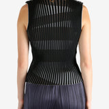 Black shirt worn by a person, showing the shirt's fit