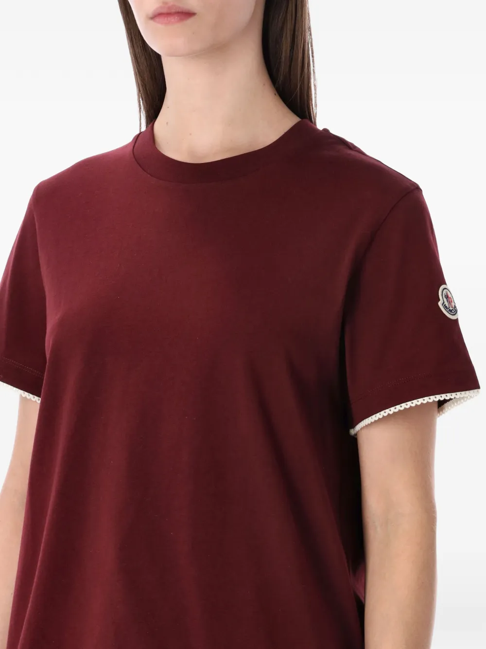Red t-shirt  worn by a person, showing the t-shirt's fit