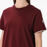 Red t-shirt  worn by a person, showing the t-shirt's fit
