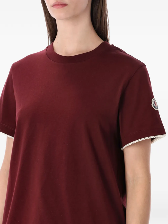 Red t-shirt  worn by a person, showing the t-shirt's fit