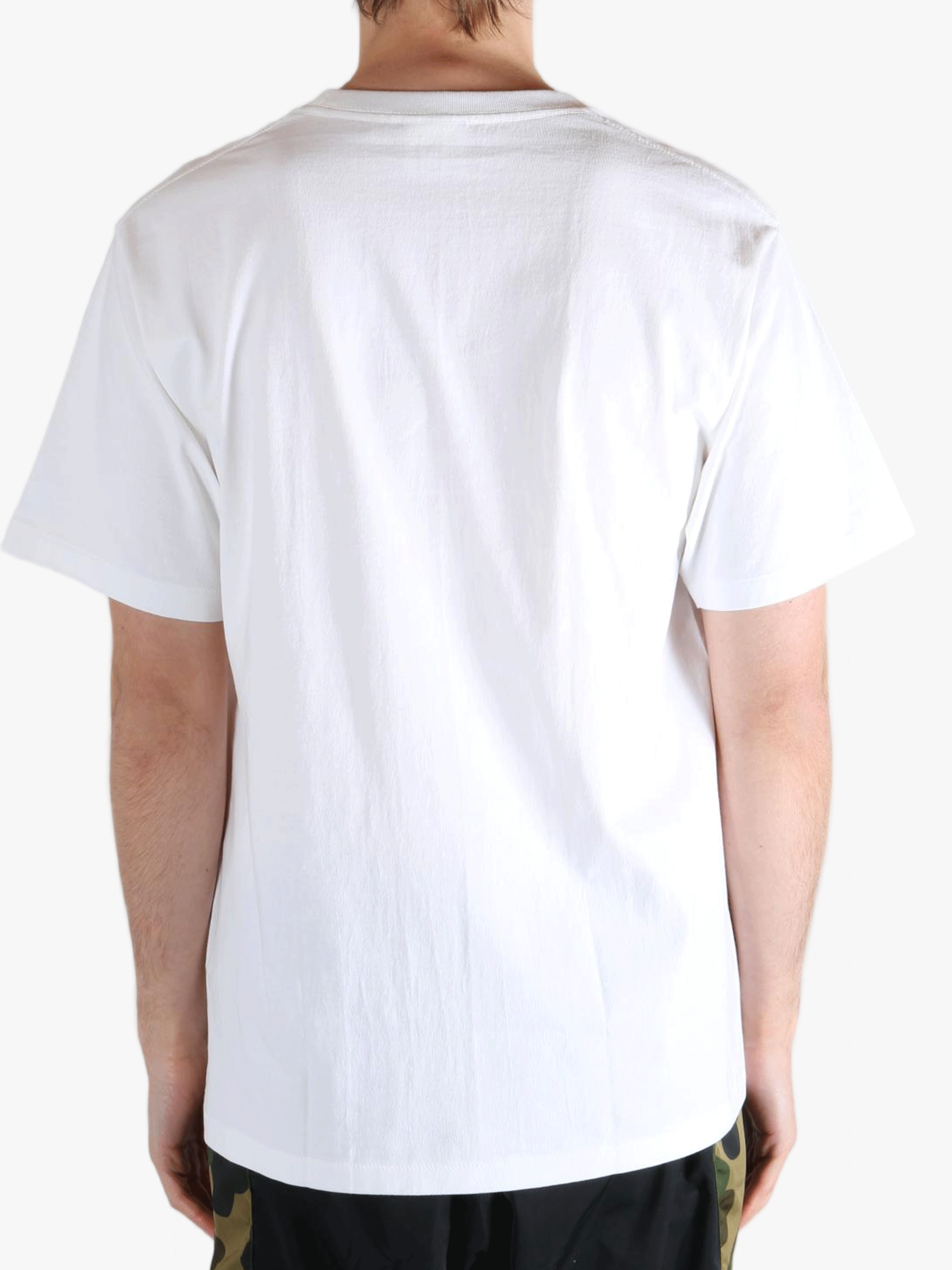 White T-shirt worn by a person, showing the t-shirt's fit