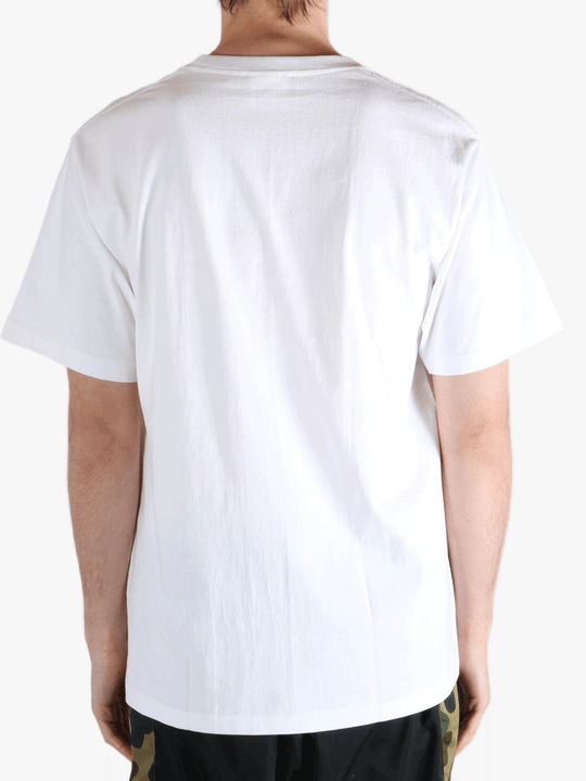 White T-shirt worn by a person, showing the t-shirt's fit