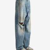 Blue pants worn by a person, showing the pants fit